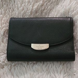 Kate spade button close wallet.